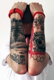 手臂彩色令人毛骨悚然的眼睛与森林字母纹身图案