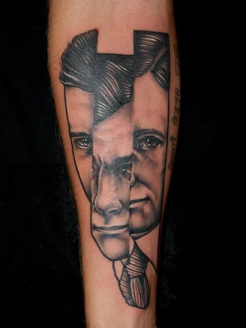 手臂黑灰支离破碎的男子肖像纹身图案