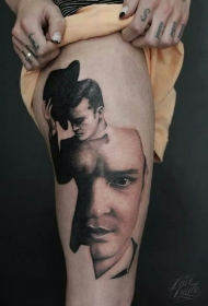 腿部超现实主义风格的彩色人物纹身