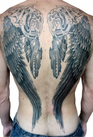 背部黑色的机械翅膀纹身图案
