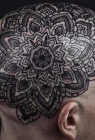 头部黑色艳丽的梵花纹身图案