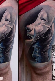 腿部彩色悲伤和快乐的面具纹身