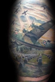 腿部彩色大轰炸机与墓地纹身图案