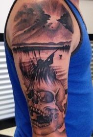 手臂黑灰风格猎人与骷髅纹身图案