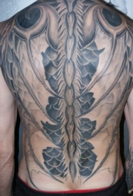 背部黑灰大龙头纹身图案