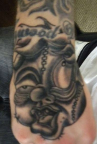 手背黑色胖子怪物纹身图案