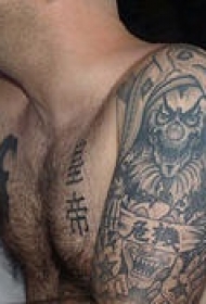 手臂死神小丑纹身图案