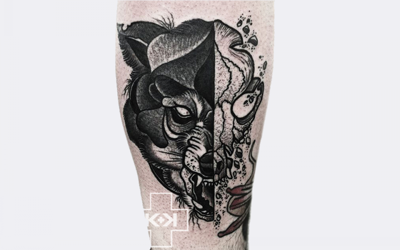 雕刻风格黑色熊头与头骨结合纹身图案