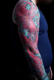 手臂华丽彩绘红色鱿鱼纹身图片