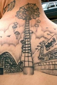 背部黑灰旧游乐场建筑纹身图案