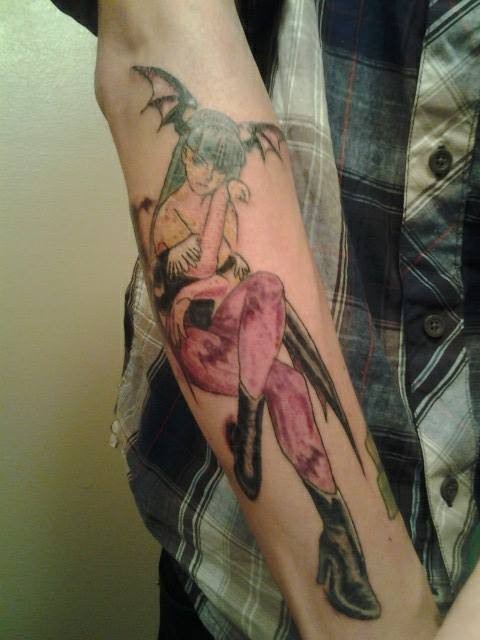 手臂亚洲卡通风格彩色恶魔女孩纹身图案