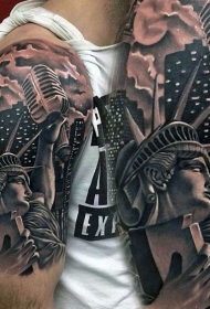 大臂有趣的黑灰自由女神像与麦克风纹身图案