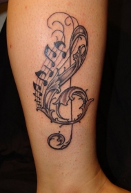 腿部黑色可爱的音乐谱号纹身图案