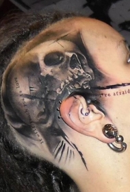 头部灰色骷髅字母纹身图案