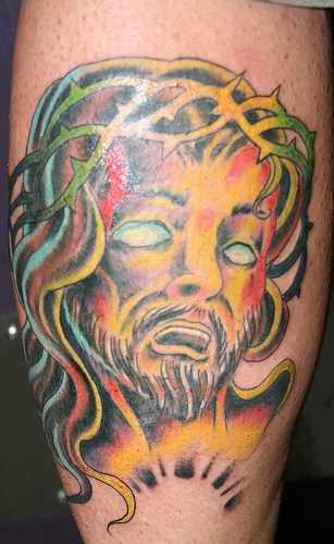 腿部彩色绝望中的耶稣纹身图案