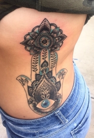 腰部彩色复古风格的神秘手花纹身图片