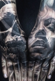 手部恐怖风格神秘女人与骷髅纹身图片