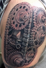 现实主义风格的发动机齿轮肩部纹身图案