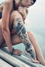 小腿黑灰音乐主题歌手和字母纹身图案