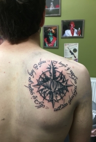 背部神秘的黑色字母和符号纹身图案