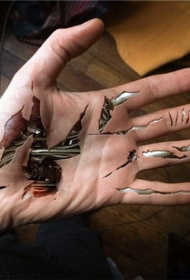 手心3D彩色撕皮和机械纹身图案