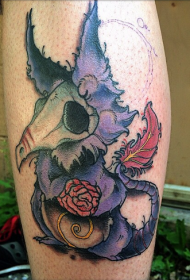 小腿彩色卡通龙形怪物和大脑纹身图案