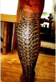 小腿黑色的机械骨骼纹身图案