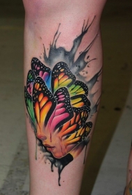 小腿彩色人脸与蝴蝶翅膀结合纹身图案