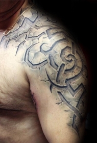 肩部黑灰石雕风古石纹身图案