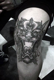 膝盖黑色恶魔头部纹身图案