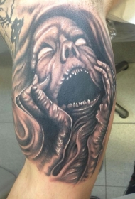 黑色恐怖风格怪物女人脸上大臂纹身图案