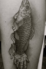 超现实主义风格的黑色手和大鱼纹身图案