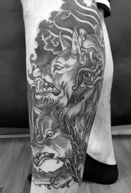 小腿雕刻风格黑色地狱犬纹身图案