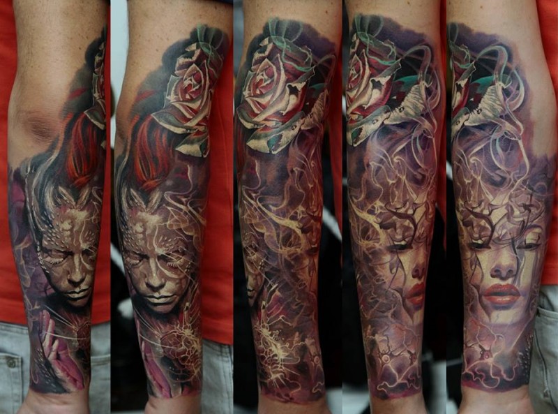 手臂彩绘精致的女性肖像和玫瑰纹身图案