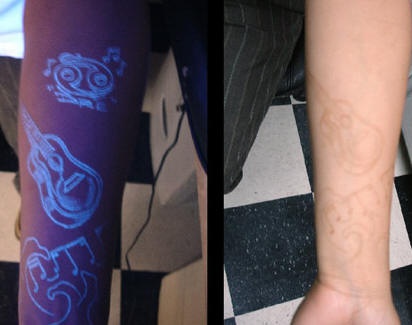 手臂吉他荧光纹身图案