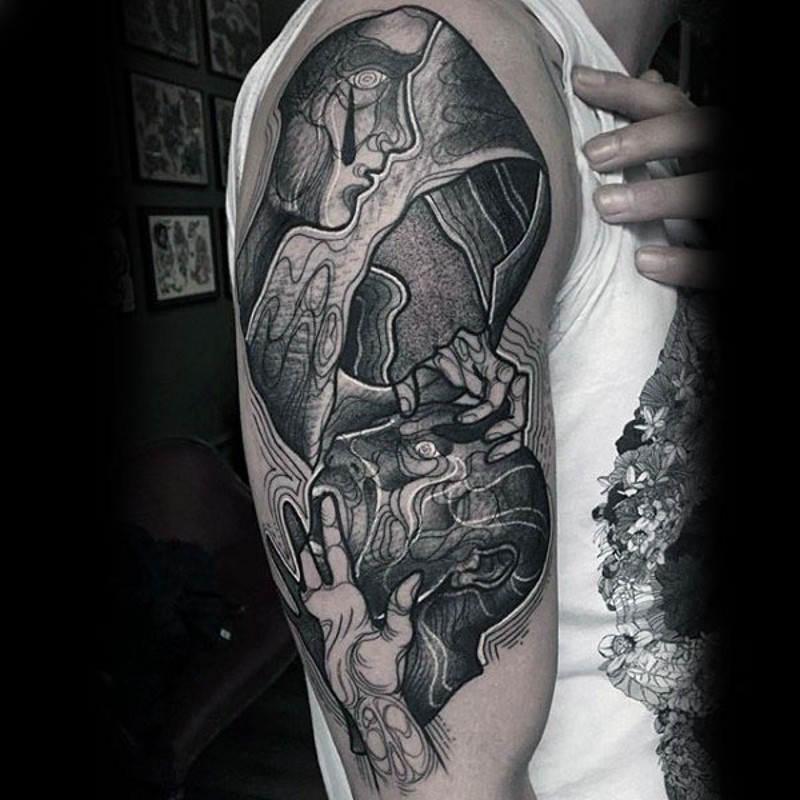 大臂神秘设计的抽象黑白人像纹身图案