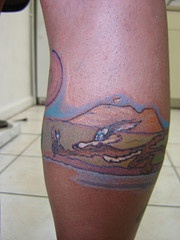 小腿奔跑的卡通动物纹身图案