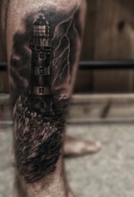 男生小腿上黑色点刺海浪和灯塔纹身图片