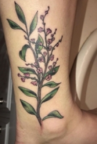 女生小腿上彩绘水彩素描创意精美花朵纹身图片