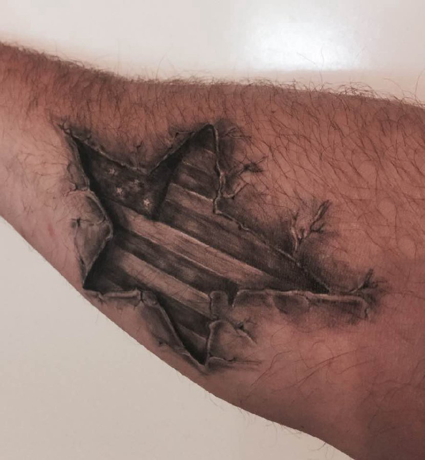 大五角星纹身 男生手臂上黑色的五角星纹身图片