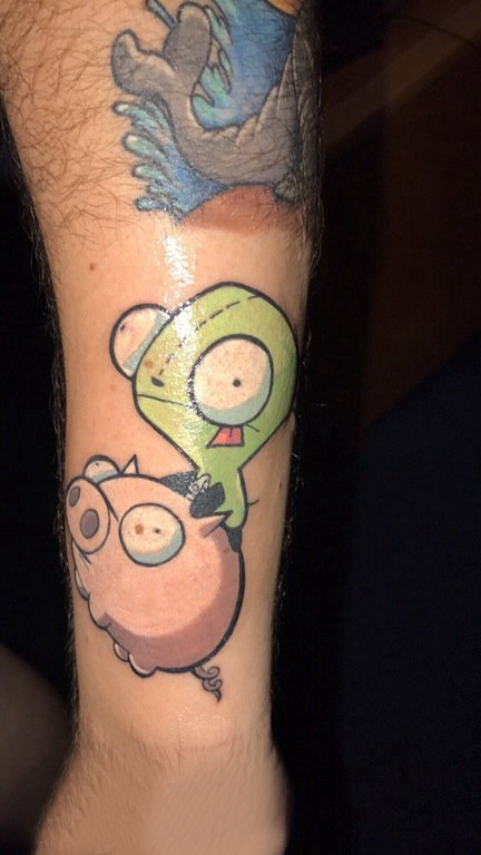 卡通可爱纹身图案 男生手臂上彩色的卡通纹身图片