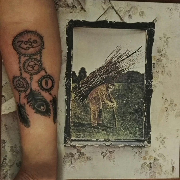 捕梦网纹身图片 男生手臂上捕梦网纹身图片