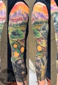 欧美花臂纹身 男生手臂上小狗和风景纹身图片
