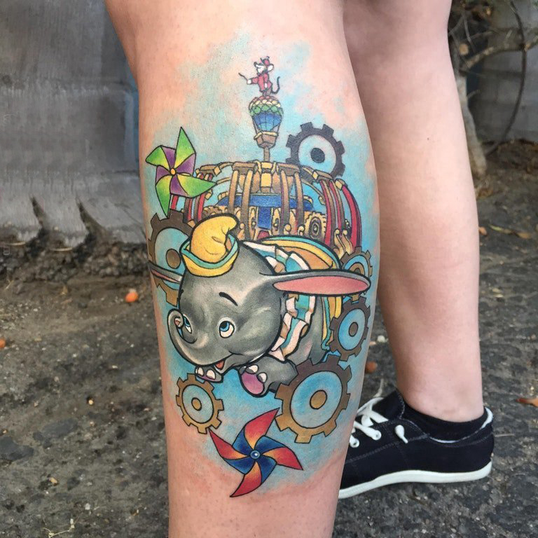 小腿对称纹身 女生小腿上彩色的象纹身图片