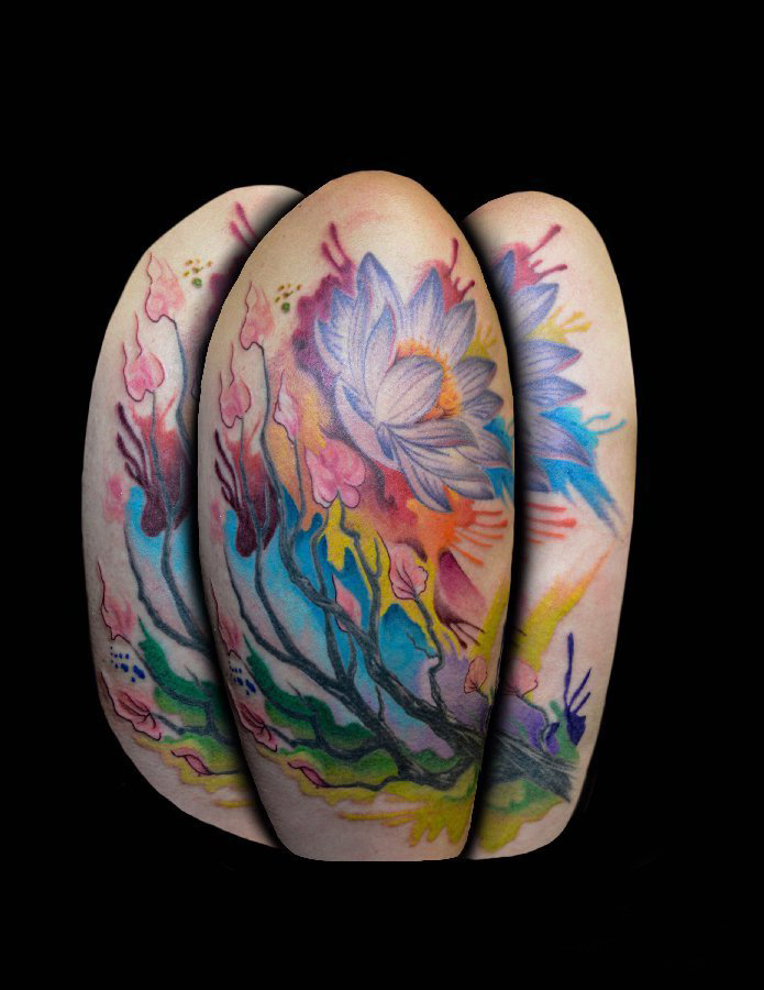 大臂纹身大全图片 男生大臂上彩色的植物纹身图片