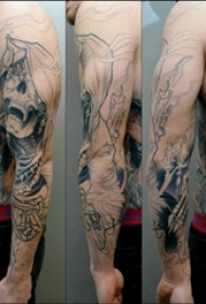骷髅纹身 男生手臂上简单线条纹身骷髅头图片