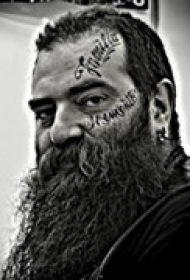 猛汉霸气脸部纹身