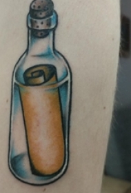 漂流瓶纹身 男生手臂上彩色的瓶子纹身图片