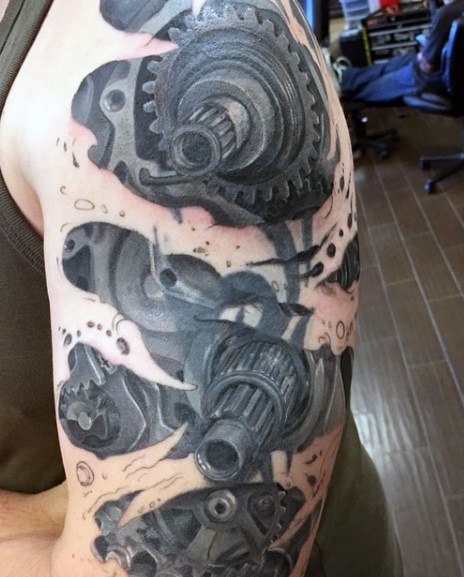 让人感觉无比有力的男性生物机械花臂纹身图案