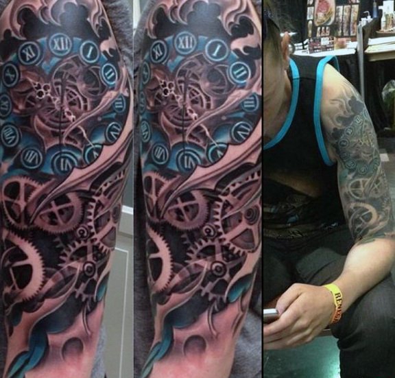 让人感觉无比有力的男性生物机械花臂纹身图案